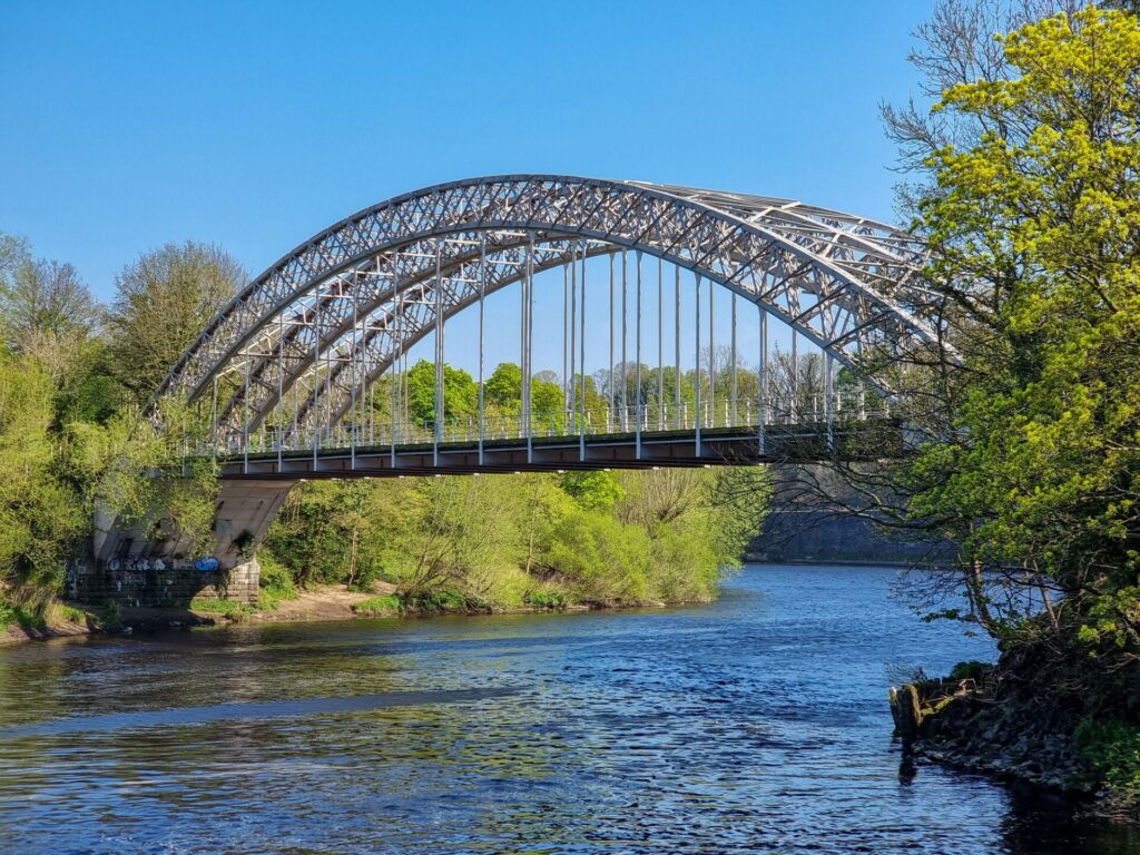 Wylam Railway bridge over the Tyne on a sunny day near Newcastle, England